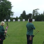 Archers drawing to fire.